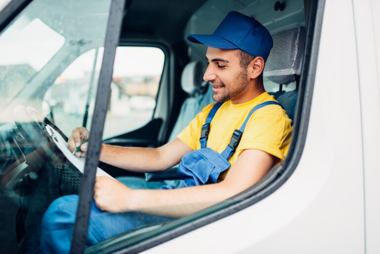 Cargo delivery, driver courier sitting in truck